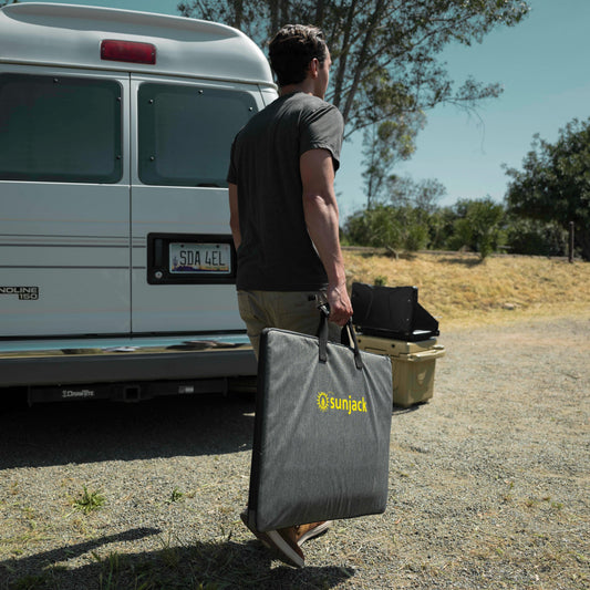 SunJack foldable solar panel powering devices outdoors