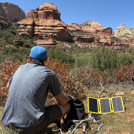 SunJack portable solar charger used while camping and backpacking